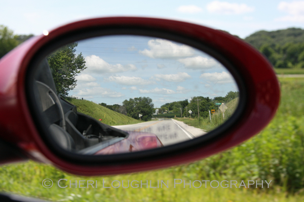 Breezy Hills Vineyard in rear view mirror - photo by Cheri Loughlin, The Intoxicologist