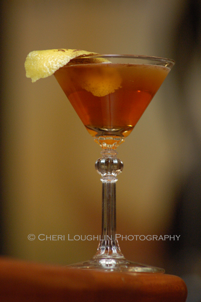 The Bobby Burns cocktail is named for the Scottish Poet, Robert Burns. This recipe is an adaptation by Omaha bartender, Chris Engles. His version uses a fabulous aromatic allspice and lemon twist garnish. - photo by Mixologist Cheri Loughlin, The Intoxicologist
