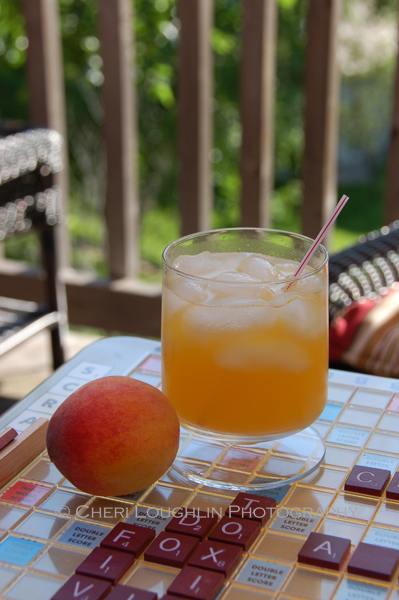 Classic Fuzzy Navel is a sexy summer sipper. Use fresh squeezed orange juice, peach vodka and add a few dashes of classic or peach bitters for summery, lush fruit flavor. ~ recipe adaption and photo by Mixologist Cheri Loughlin, The Intoxicologist
