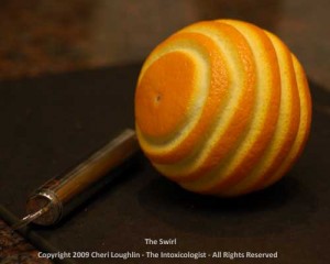 The Swirl - Orange Twist Garnish - photo copyright Cheri Loughlin