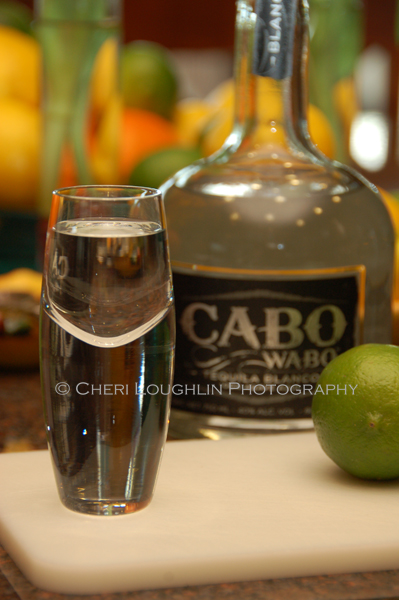 Cabo Wabo Tequila 5 with shot and limes shown - photo by Mixologist Cheri Loughlin, The Intoxicologist