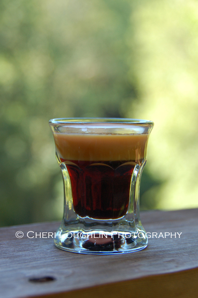 Baby Guinness layered shot is meant to mimic the look of a real Guinness beer when layered correctly. It is an easy two ingredient drink recipe.