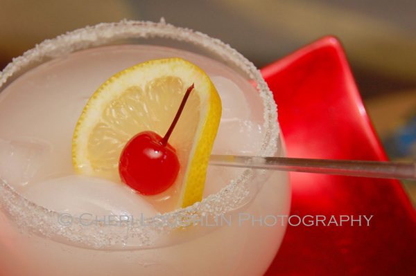 Cherry Blossom Frozen Cocktail with Cherry and Lemon Wheel Cocktail Garnish