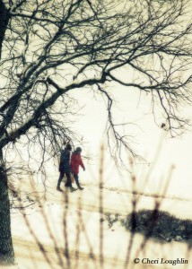 Snowy Walking Couple photo copyright Cheri Loughlin