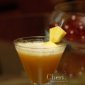 Glitter Island - Malibu Rum, Hiram Walker Peach Schapps, Pineapple Juice, Apricot Nectar, Brut Champagne