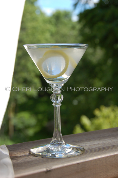 Martini - 2 ounces Gin (Vodka can be used), Dry Vermouth, Lemon Twist. - photo by Mixologist Cheri Loughlin, The Intoxicologist