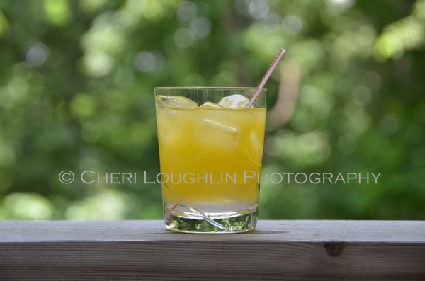 Peach Bikini Cocktail variation on the higher calorie Fuzzy Navel summer favorite - recipe and photo by Mixologist Cheri Loughlin, The Intoxicologist