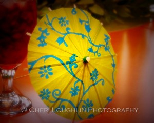 Garnishing drinks with cocktail umbrellas is simple and works well with Tiki style drinks and beach worthy cocktails. Vacation anyone?! - photo by Cheri Loughlin, The Intoxicologist