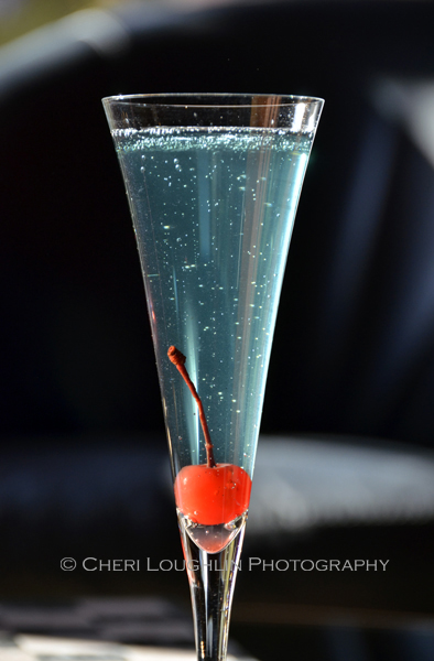 Lava Lamp blue drink appropriate for 4th of July celebrations - recipe and photo by Mixologist Cheri Loughlin, The Intoxicologist