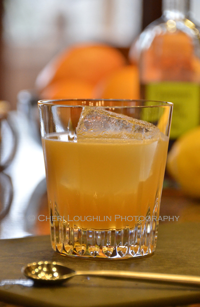 Sam Ross created the Penicillin drink in 2005. He uses a house made Honey-Ginger Syrup. I used a Ginger-Vanilla Syrup. - photo by Mixologist Cheri Loughlin, The Intoxicologist
