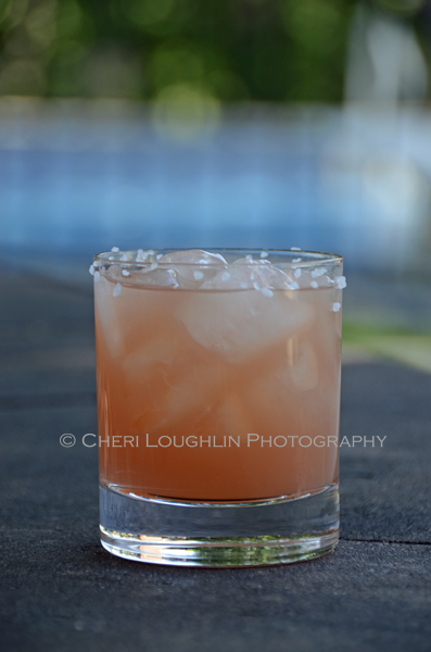 This South Pacific recipe is a rum and passion fruit influenced tropical variation of the Salty Dog - recipe & photo by Mixologist Cheri Loughlin, The Intoxicologist
