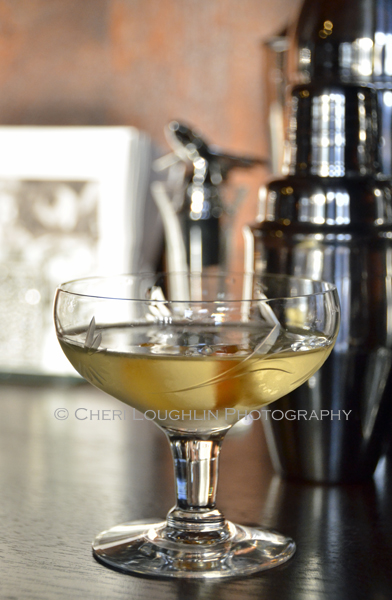 The Wizard Cocktail from Vodka Distilled turns out with rich layered flavor. There is a bit of citrus spice in the aroma. A mix of orange and herbal notes linger on the tongue. - photo by Mixologist Cheri Loughlin, The Intoxicologist