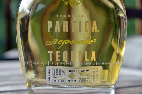 Partida Tequila Reposado 012 close up of bottle label. - photo by Mixologist Cheri Loughlin, The Intoxicologist