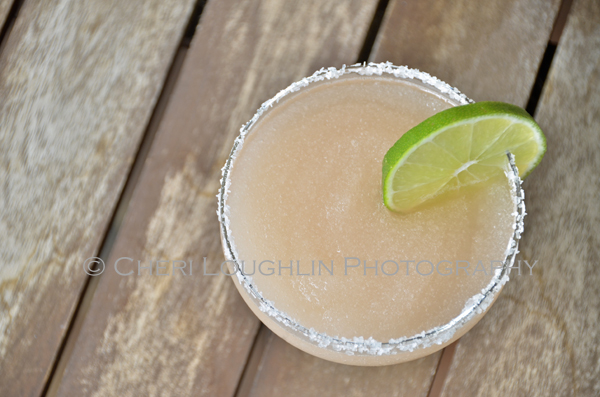 Partida Tequila Ruby Red Grapefruit Margarita 116 contains some of the same flavor elements of a classic Paloma long drink; Tequila, Lime and Grapefruit. This Margarita variation is a blended frozen drink with additional premium orange liqueur. Top it with a float of Cassis for wonderful lush flavor. - recipe and photo by Mixologist Cheri Loughlin, The Intoxicologist