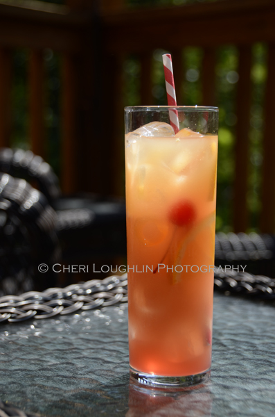 Tiki Screwdriver 093 is a Tiki drink variation on the classic Screwdriver long drink. Tiki Screwdriver uses Shellback Silver Rum, Passionfruit Juice, Ruby Red Grapefruit Juice and Grenadine in addition to the usual Screwdriver ingredients. The recipe could be multiplied for pitcher or punch bowl use. Ideal for National Rum Punch Day. - photo and recipe by Mixologist Cheri Loughlin, The Intoxicologist