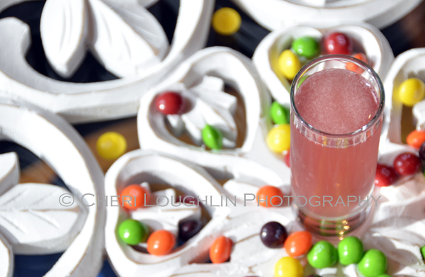 Skittle Shot 076 is a fun candy themed shot ideal for Halloween parties, celebrating PINK for Breast Cancer Awareness month and of course raising a toast to National Vodka Day. - photo credit to Mixologist Cheri Loughlin, The Intoxicologist
