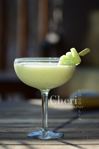 Honeydew Me Daiquiri – recipe by Cheri Loughlin, The Intoxicologist 2 ounces Shellback Silver Rum 1 cup fresh Honeydew Melon – cut small chunks 1 ounce fresh Lime Juice 1-3/4 ounce Cream of Coconut 1 cup Crushed Ice Honeydew Slices Garnish