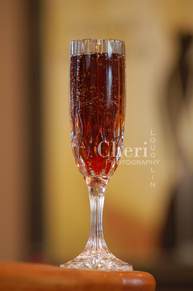 The Black Pearl champagne cocktail is lush tasting with dark, rich color. It is easy to make with three liquid ingredients and simple maraschino cherry garnish.