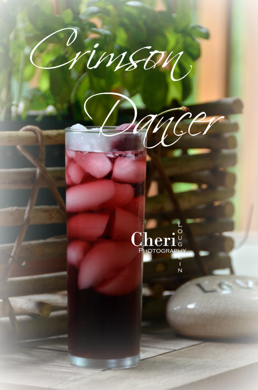 The Crimson Dancer is a fun and easy long drink. It’s also lower in alcohol content than many common cocktails since it uses wine as the base ingredient.