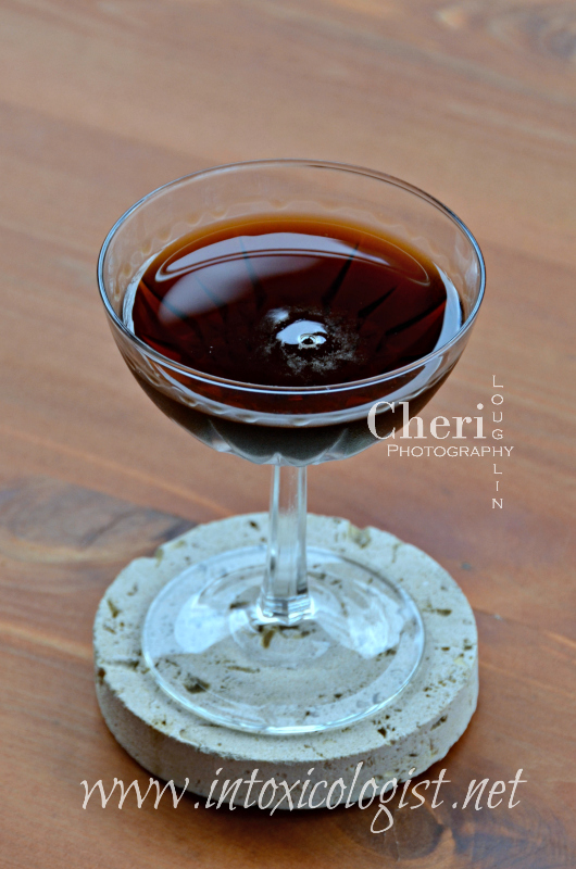 Barrel-aged San Gennaro Manhattan brings out the bittersweet notes of Amaro and Campari, giving this cocktail a decadent and completely satisfying flavor.