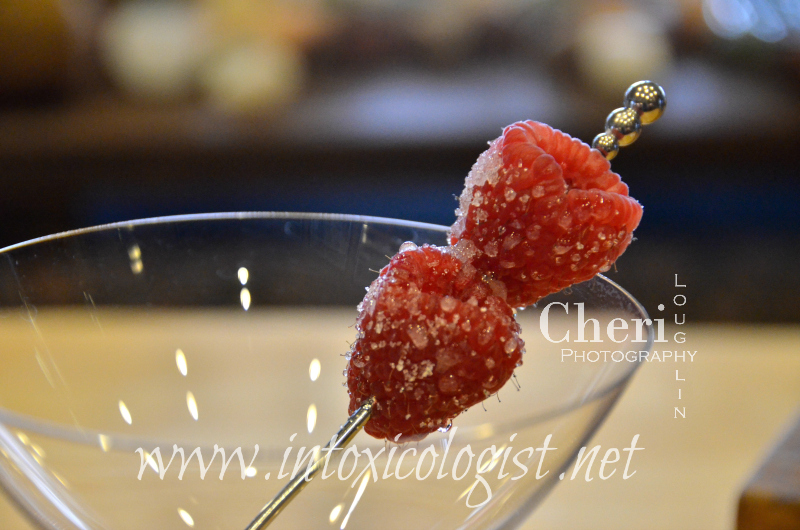 Sugar coated raspberries garnish for the Raspberry Peach Citrus Drop with Pinnacle Raspberry Vodka.