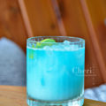 The Mermaid Margarita is a tropical, take me to the beach margarita style cocktail. Blue Curacao provides the deep blue sea color, while coconut and lime juice capture the essence of white caps on waves.
