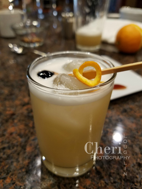 The J. Rieger Whiskey Genessee St. Sour with amaretto and orange bitters is light and refreshing with just the right touch of sweetness.